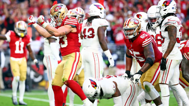 Dec 17, 2023; Glendale, Arizona, USA; San Francisco 49ers running back Christian McCaffrey (23) celebrates after running for a touchdown during the third quarter against the Arizona Cardinals at State Farm Stadium. Mandatory Credit: Mark J. Rebilas-USA TODAY Sports